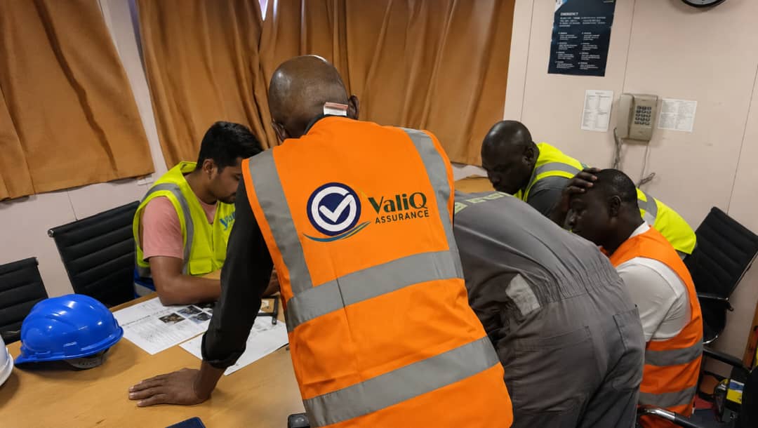 Technical team discussing field findings